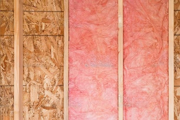pink-strips-of-fiberglass-insulation-in-a-wall-transformed